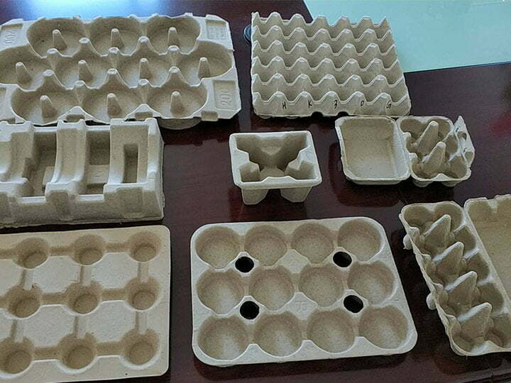 Various paper pulp trays made by the egg tray production line